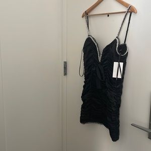 Never worn; new with tags.